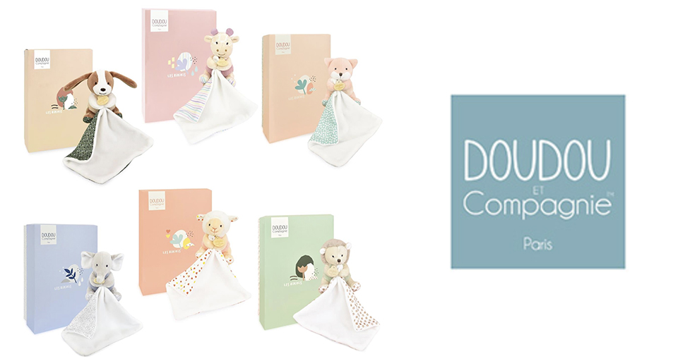 Une collection de peluches et de couvertures de la marque "Doudou et Compagnie" avec un logo et le texte "Paris" bien en évidence.