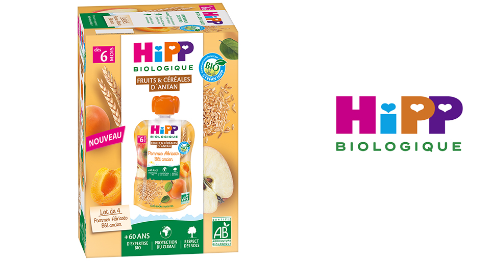 Emballage d'un produit alimentaire étiqueté "HiPP Biologique", qui met l'accent sur les ingrédients biologiques et naturels, y compris les fruits et les céréales.