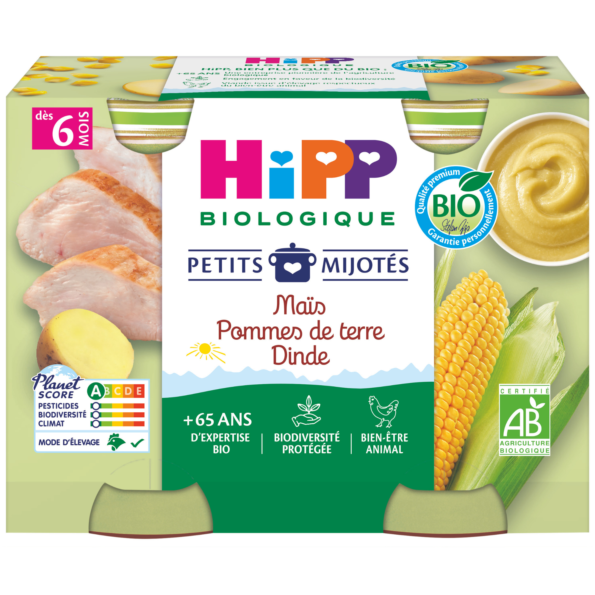 Emballage d'un produit alimentaire privilégiant les ingrédients biologiques et naturels, notamment la viande, le maïs et une substance crémeuse, avec un label Planet Score indiquant l'impact sur l'environnement.