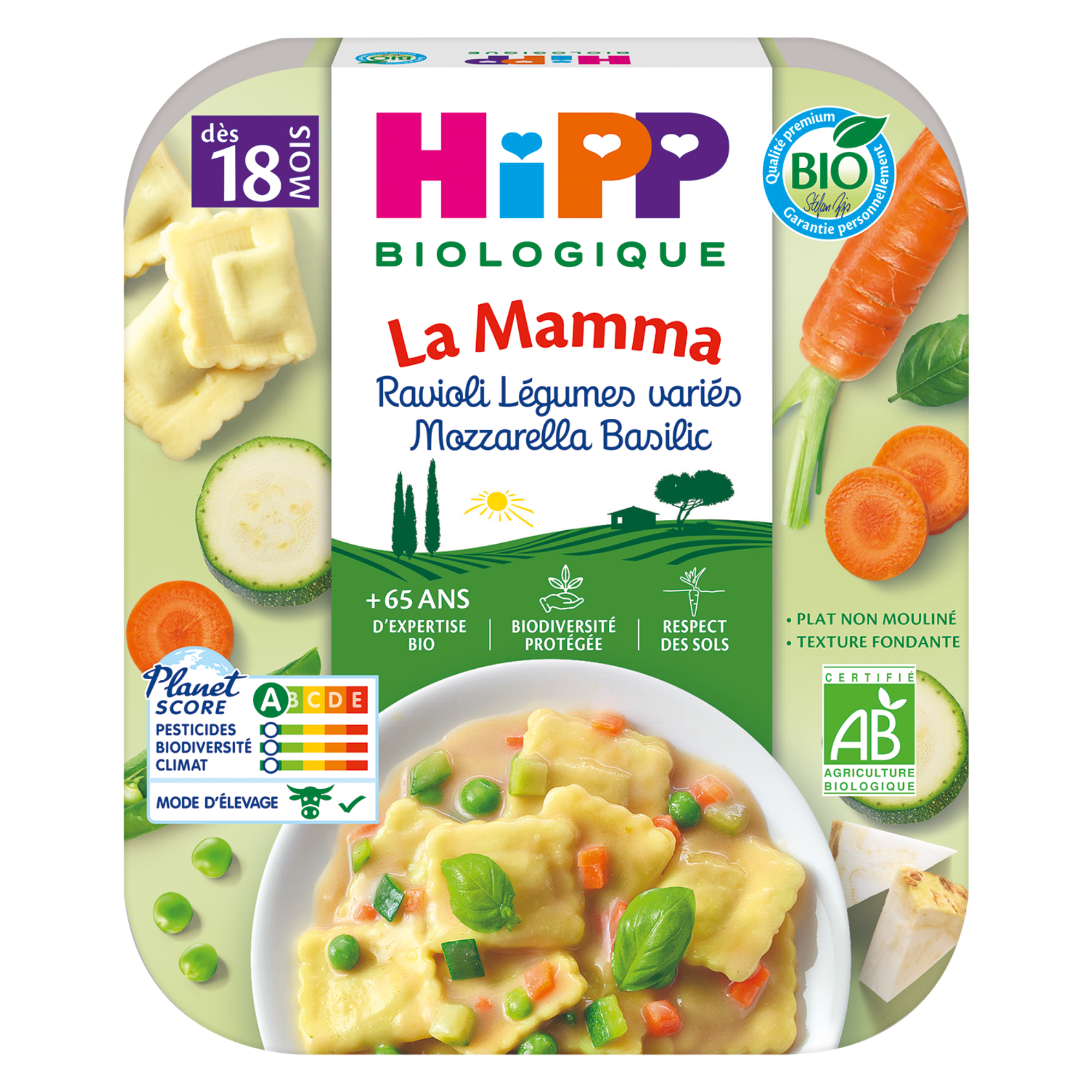 Un produit alimentaire emballé avec une étiquette indiquant "HiPP Biologique La Mamma Ravioli Legumes varie Mozzarella Basilic", indiquant qu'il s'agit d'un produit alimentaire biologique pour bébés avec des raviolis, des légumes mélangés et de la sauce mozzarella basilic.